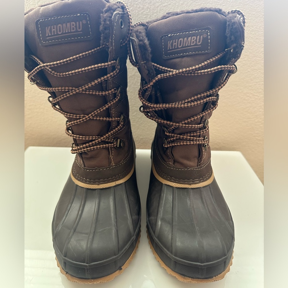 Khombu Annabel brown waterproof fleece lined insulated duck toe lace-up boots.